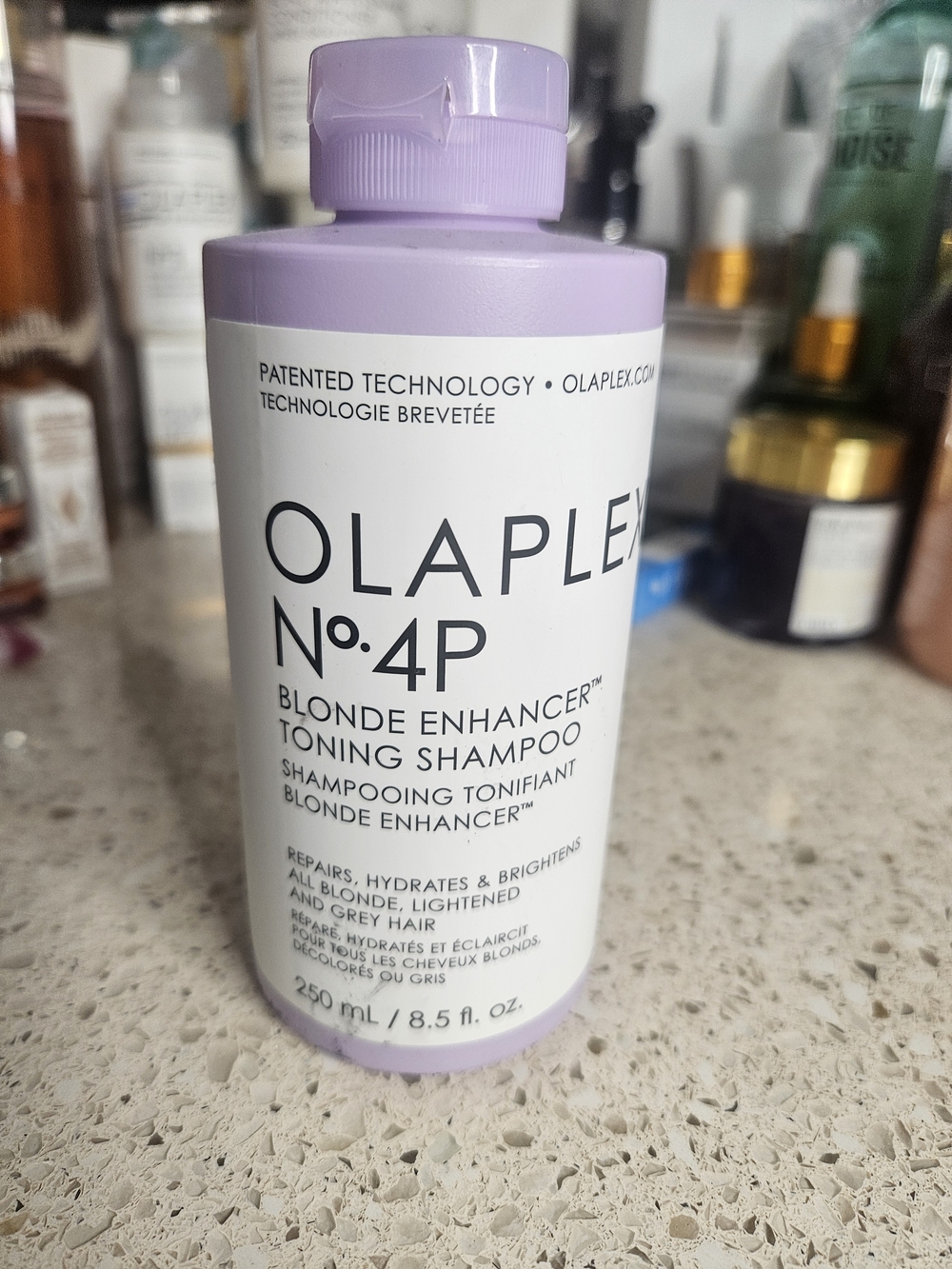 OLAPLEX No.4P Blonde Enhancer Toning Shampoo - Lavender & White